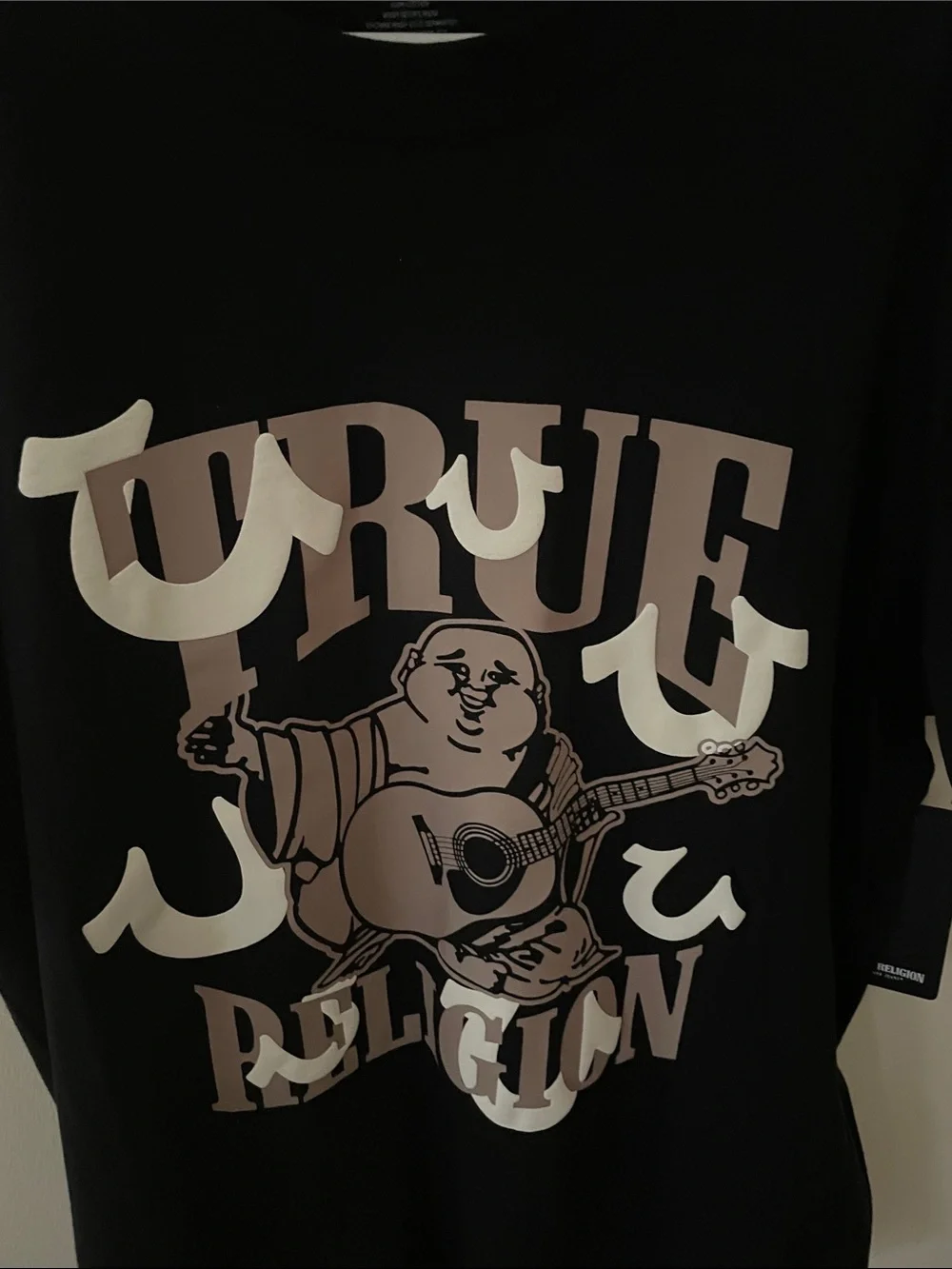 True Religion Black Tee with Beige Graphic Buddha Guitar Logo